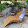 Bain de soleil ou chaise longue en rotin rénové(e)