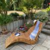 Bain de soleil ou chaise longue en rotin rénové(e)