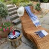 Bain de soleil ou chaise longue en rotin rénové(e)